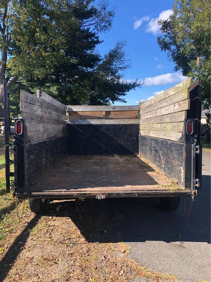 Empty driveway friendly dumpster from C&L junk removal 15 yard